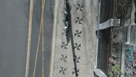 Aerial-view-of-the-historic-streets-and-cobblestone-of-Lisbon-on-a-sunny-day