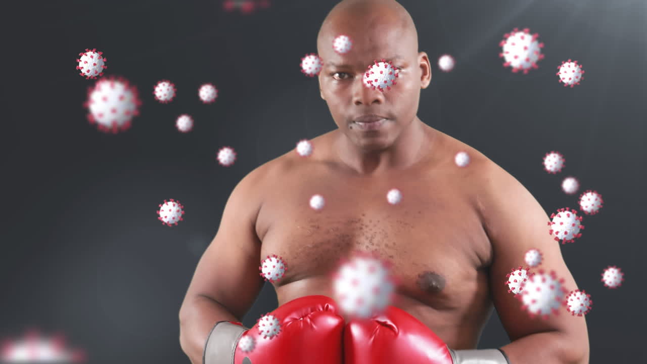 animación de células de virus sobre el boxeo de hombres afroamericanos