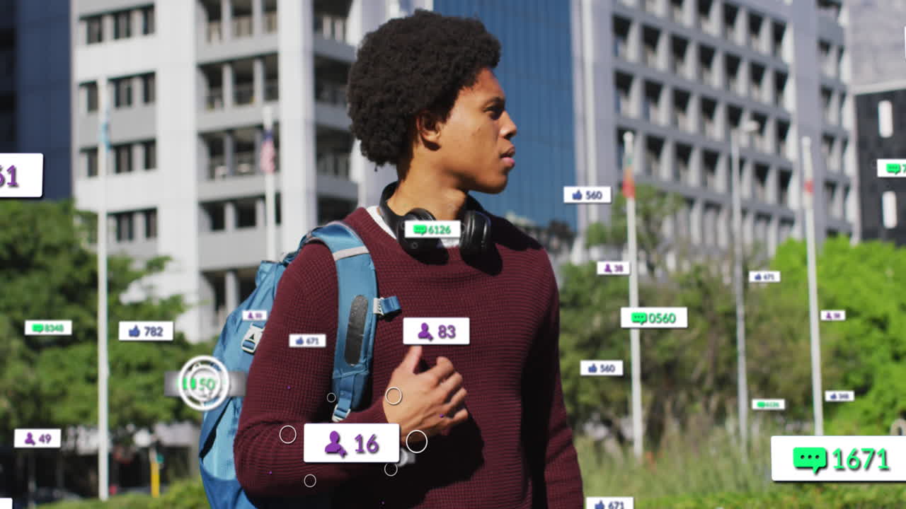 Animation of changing numbers, icons over biracial man standing and looking at smartwatch