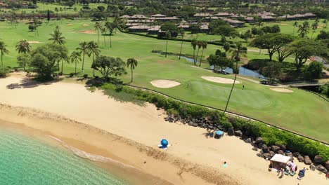 aerial flyover of may's beach and kaanapali golf course in maui, hawaii