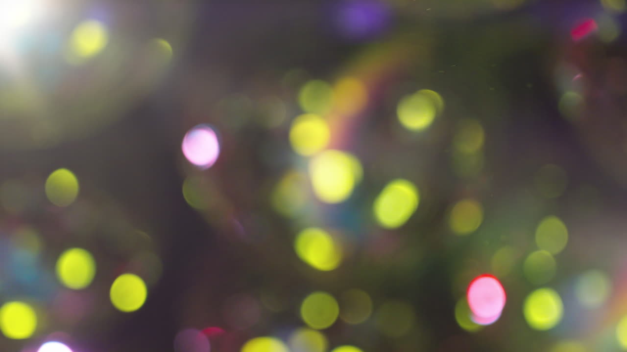 Sfondo astratto di luci bokeh colorate in movimento