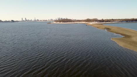 Fly-over-bay-and-wetland,-Squantum,-Massachusetts