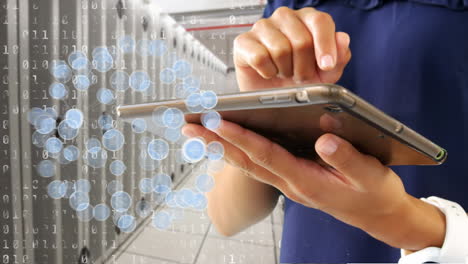 woman typing on a tablet