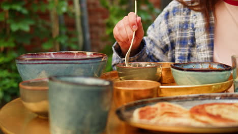 outdoor meal with colorful dishes