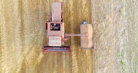 Combine-Harvester-Working-In-Agricultural-Field-2