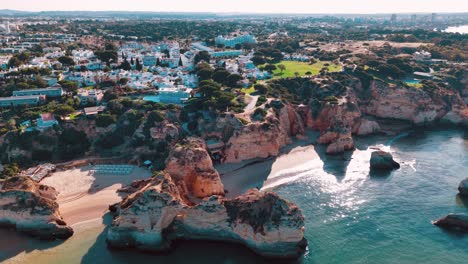 coastal cliffs and beach in portugal offer stunning aerial view