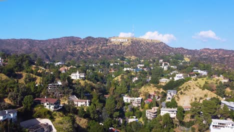 drone shot pulling out of the hollywood sign