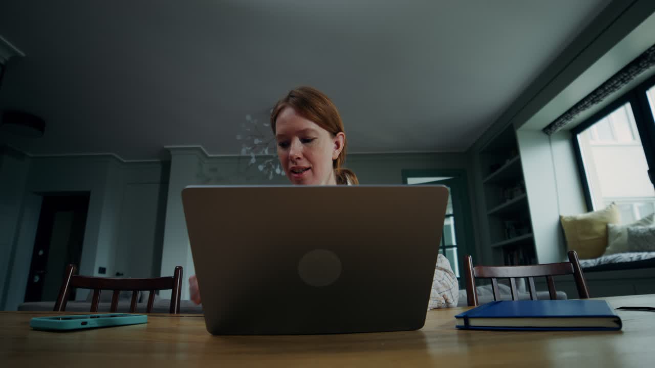 Woman working from home on laptop