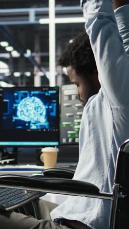 vertical video engineer using wheelchair in data center using ai node tree software