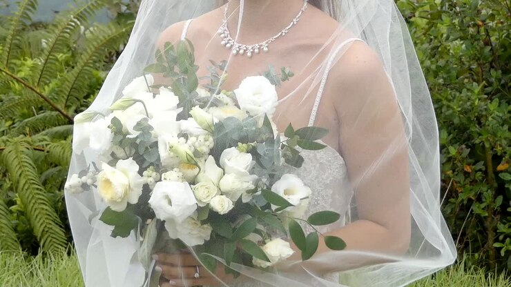 shot of bride - groom with wedding flower