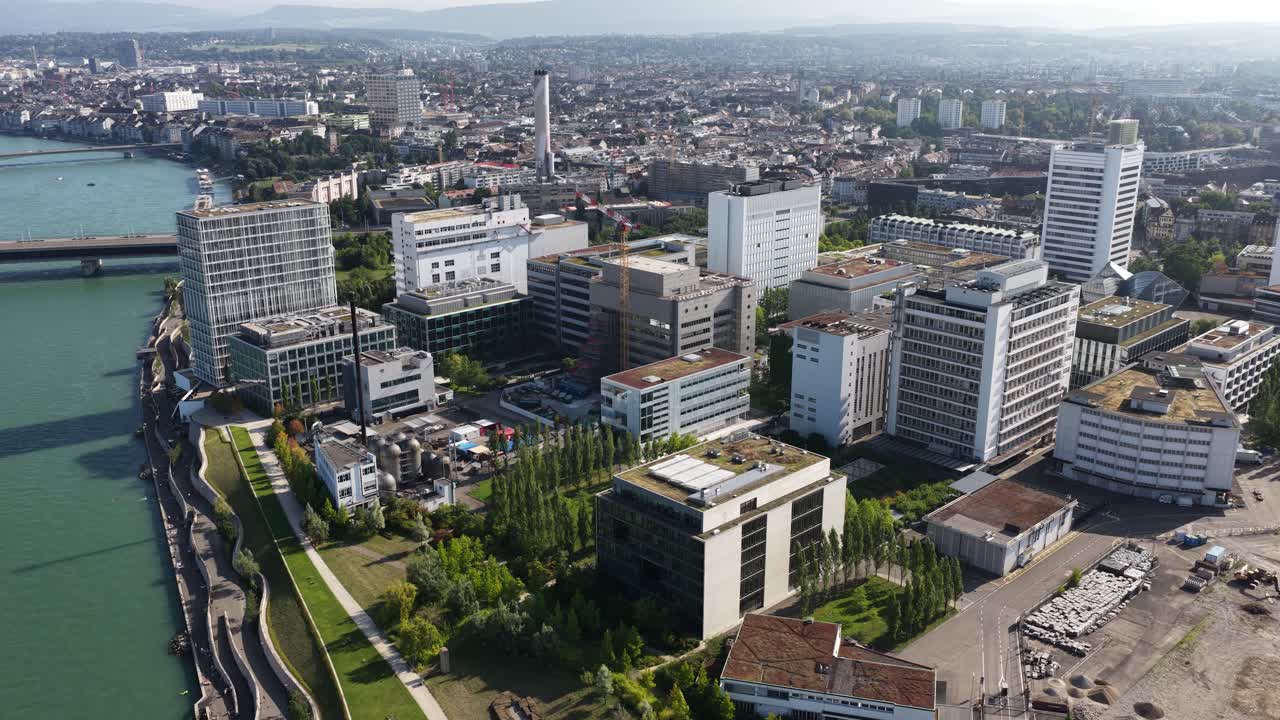 The Novartis Campus in Basel, Switzerland, focusing on life sciences, pharmaceutical innovation, and corporate architecture, aerial drone video