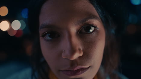 close-up-portrait-beautiful-mixed-race-woman-on-rooftop-at-night-smiling-happy-enjoying-urban-nightlife-with-bokeh-city-lights-in-background