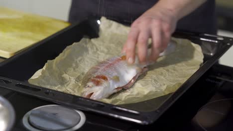preparing a baked trout