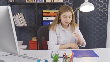 business woman coughing in office.