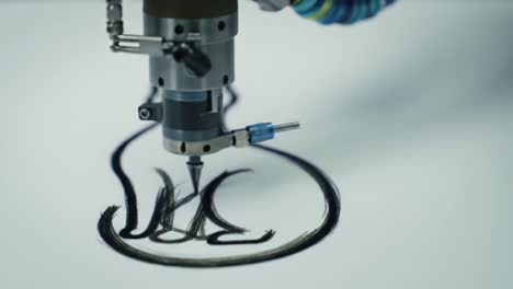 automated precision drawing machine capturing intricate lines and patterns on paper in two stages of artistic creation and design