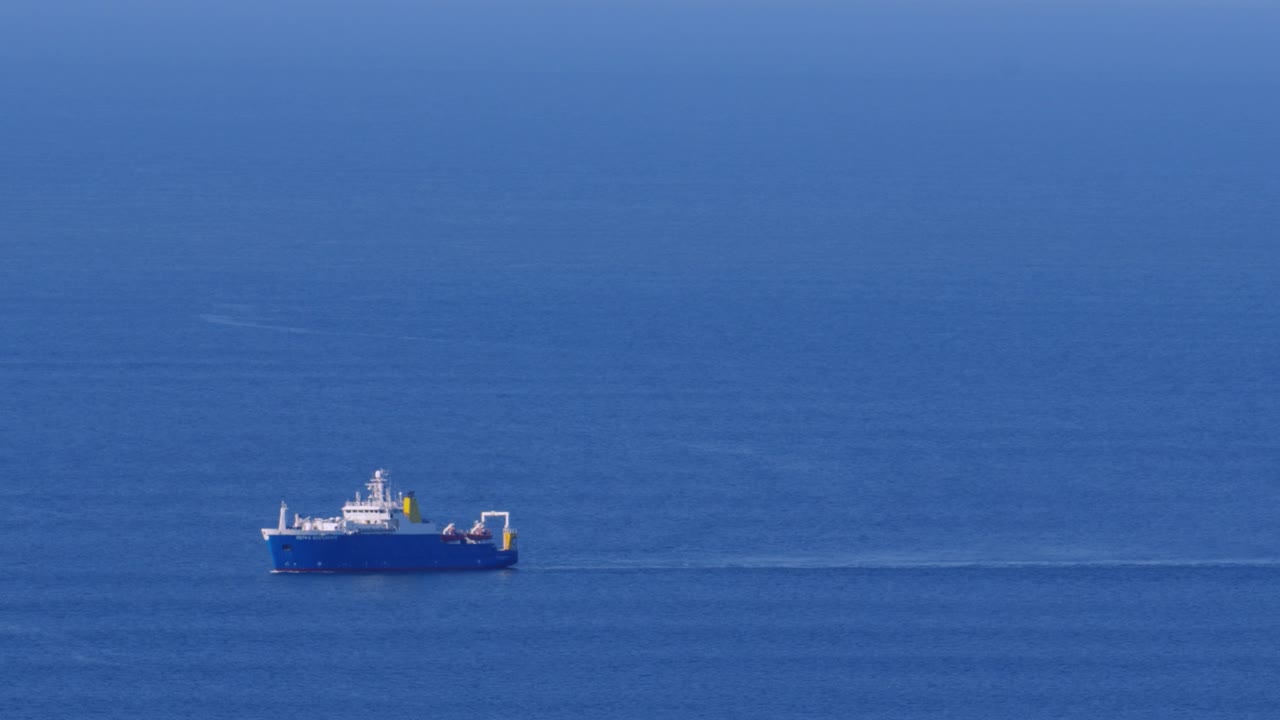 Large Fishing Vessel at Sea Trawling Depths of Ocean for Seafood including Haddock, Cod Fish in British Coastal Waters 4K