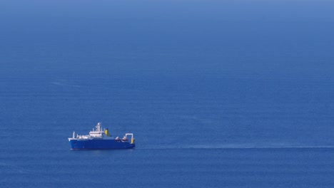 large fishing vessel at sea trawling depths of ocean for seafood including haddock, cod fish in british coastal waters 4k
