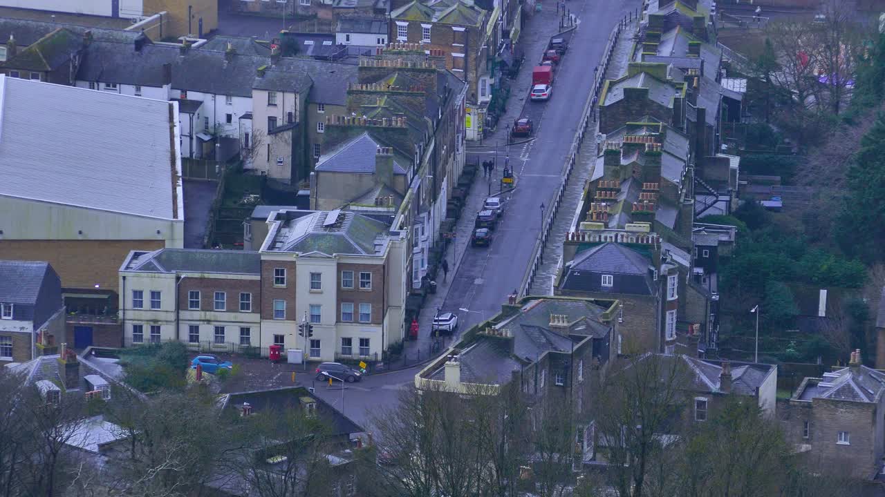 Aerial view from the castle of a street with cars in Dover, England