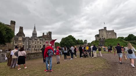 people gathering and exploring cardiff castle grounds