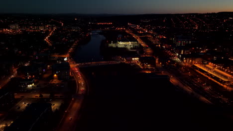 view of sherbrooke city in canada at nighttime - aerial drone shot