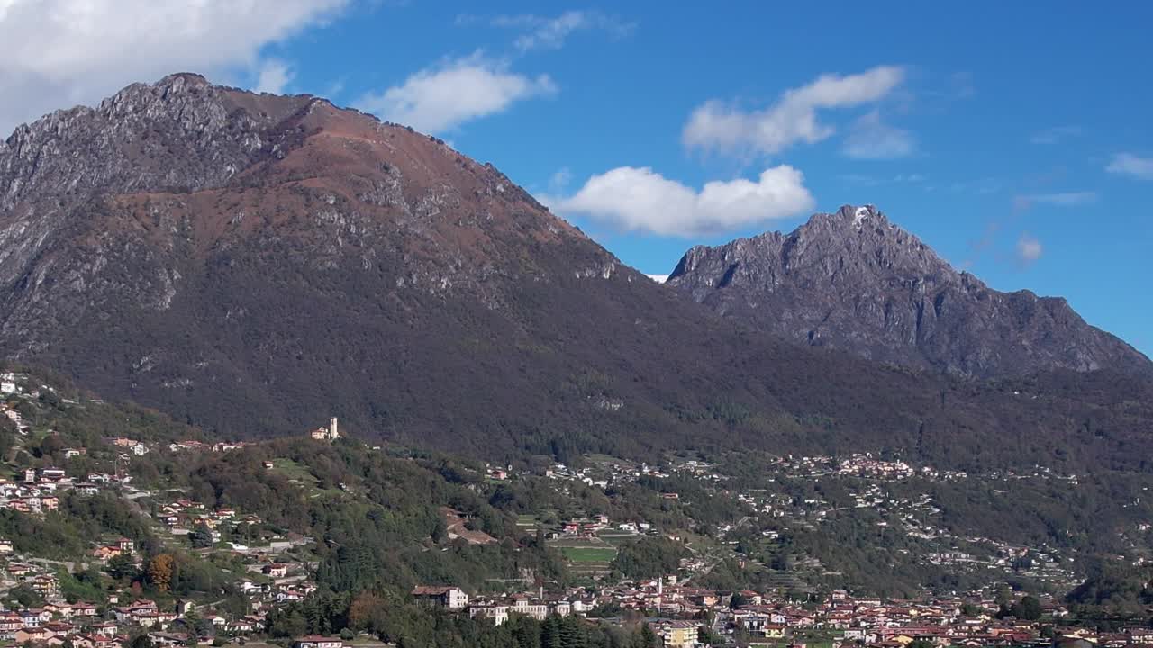 Stunning aerial view of the Alps in Italy revealing lush landscapes