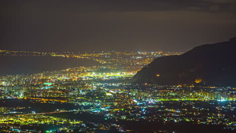 high angle shot of palermo downtown in at nigh time with beautiful night lights in sicily, italy in timelapse