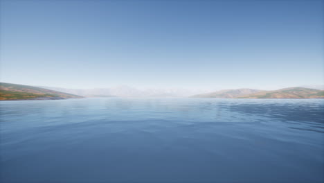 lake in hills on summer day