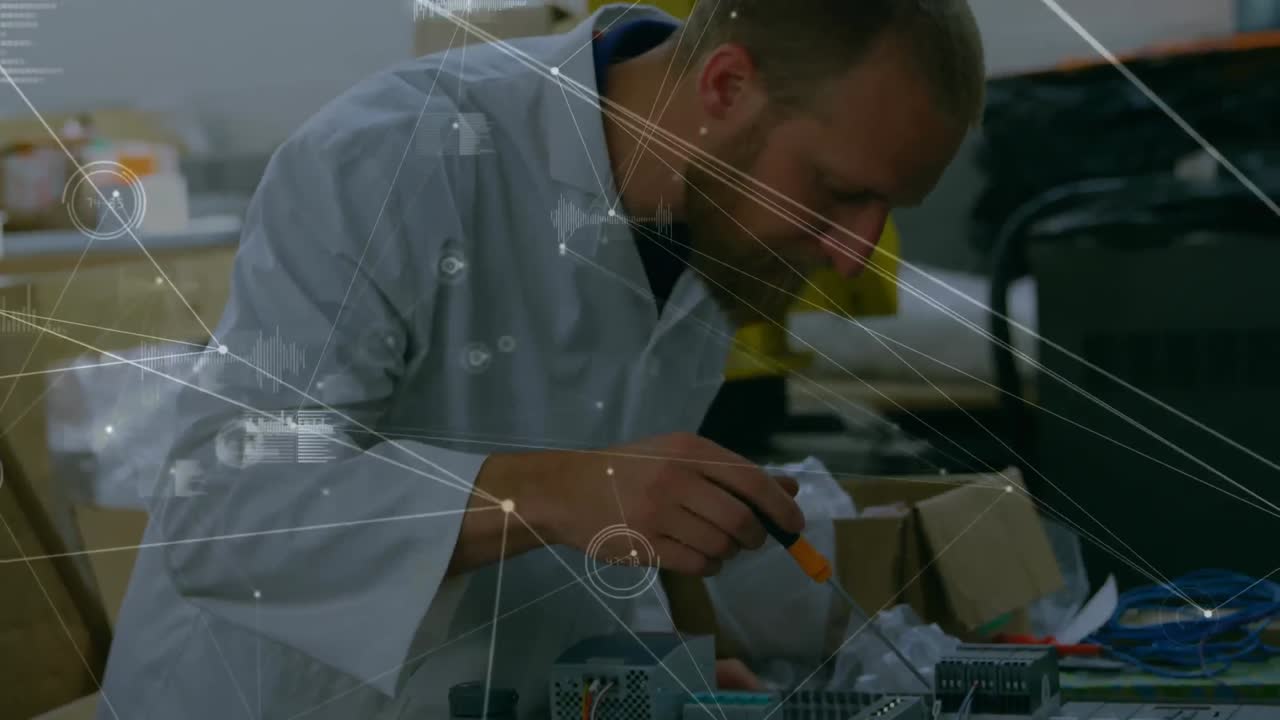 Animation of network of connections over caucasian man repairing computer hardware