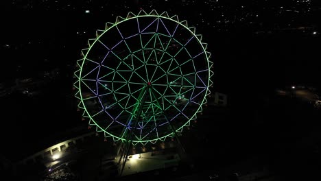 Aerial-night-panorama:-Vibrant-Ferris-wheel-at-Aztlan,-Parque-Urbano,-Chapultepec