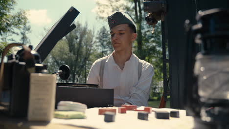 wwii german soldier listening to records