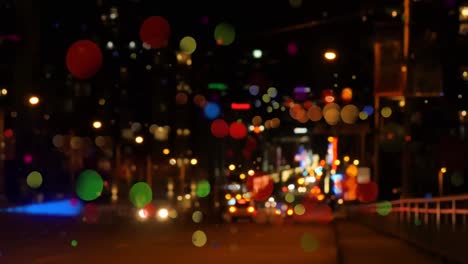 animación de puntos que se mueven sobre el tráfico vial nocturno
