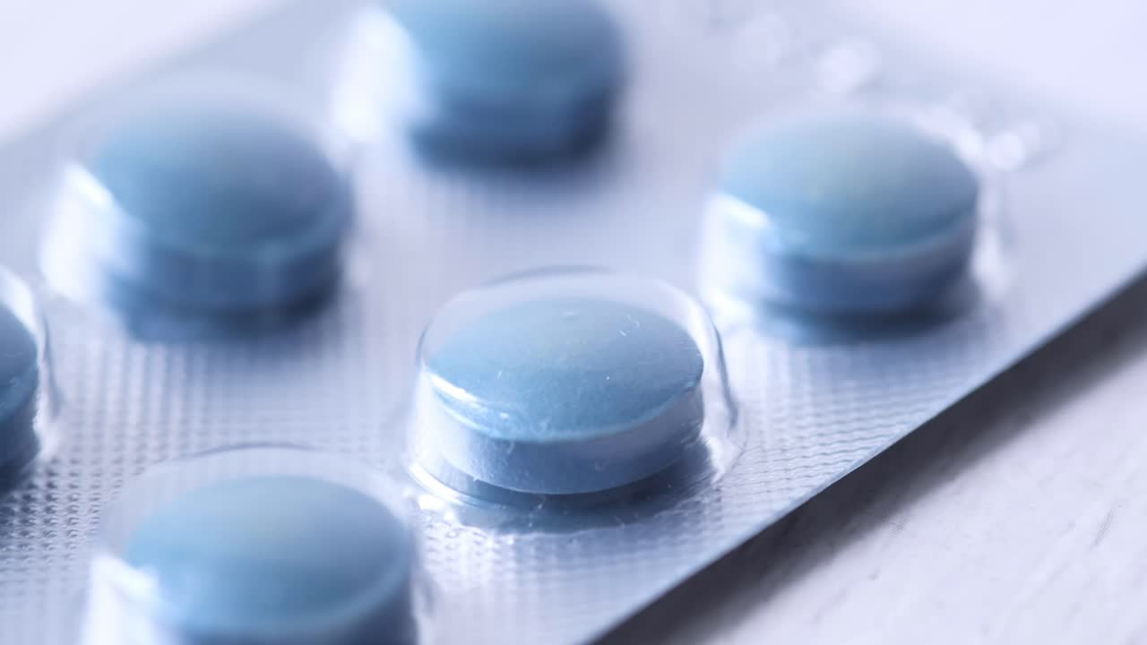 Close-up of Blue Pills in Blister Pack