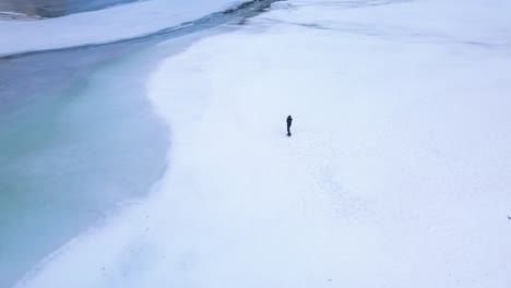the drone is orbiting around a photographer who is taking photos of the beautiful klöntal in switzerland