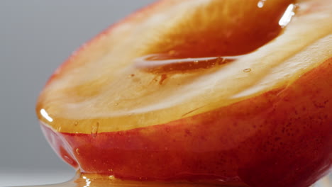 honey-drizzled plum slice close-up