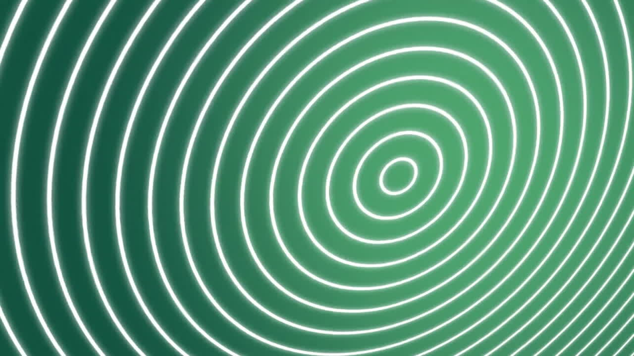 검은색 배경에 반이는 색 선이 있는 녹색 동심 원을 생성합니다.