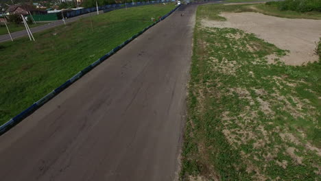 motorcyclist riding on sport bike at speedy road. drone view moto competition