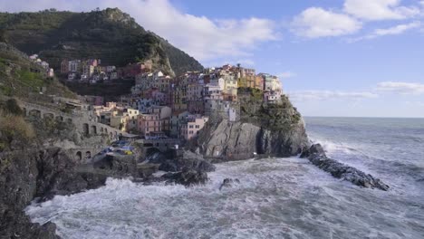 Aerial-view-of-Manarola,-5-Terre,-during-a-sea-storm