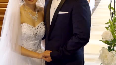 shot of bride - groom with wedding flower