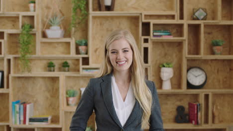 portrait of attractive young blonde business executive laughing confident successful independend woman