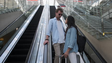 couple on an escalator