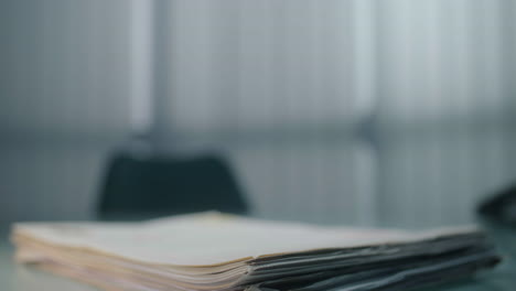 stack of papers on a desk