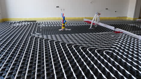 installation of underfloor heating inside the house