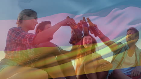 composite video of waving germany flag against two diverse couples toasting beers outdoors