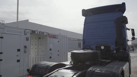 truck and container at industrial facility