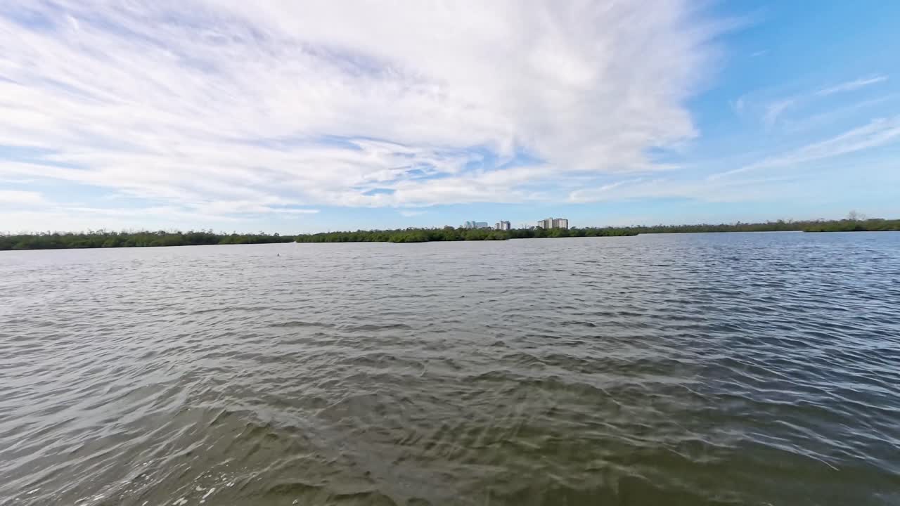 Cruising the inlet on the way to Keewaydin island on a bright sunny day in November.
