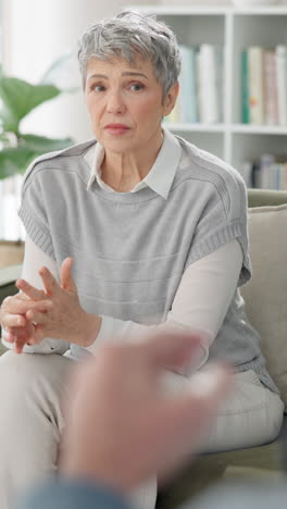 woman talking to therapist