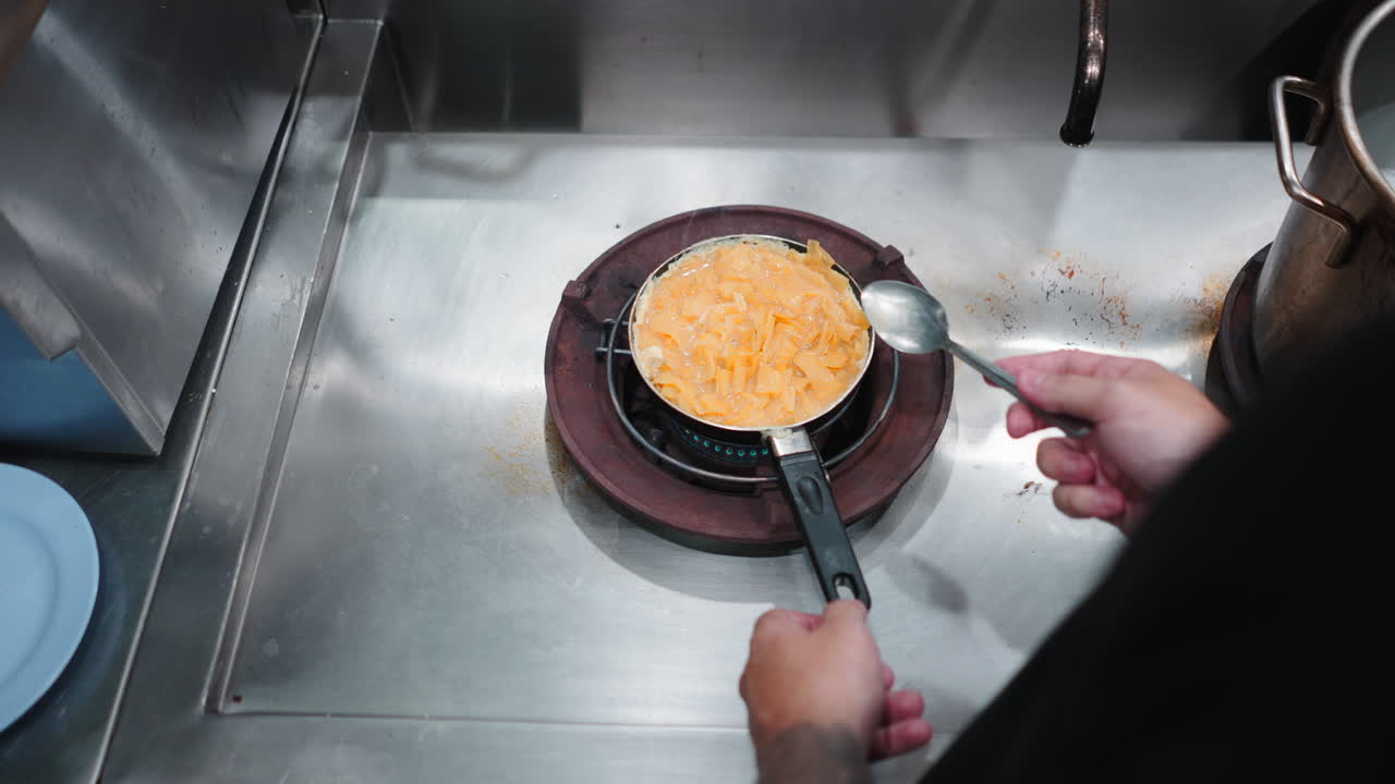 Cooking an Omelet in the Kitchen