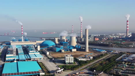 Aerial-view-of-oil-depot,-an-oil-refinery,-truck-transporting-fuel-and-gasoline,-gas-storage-terminal