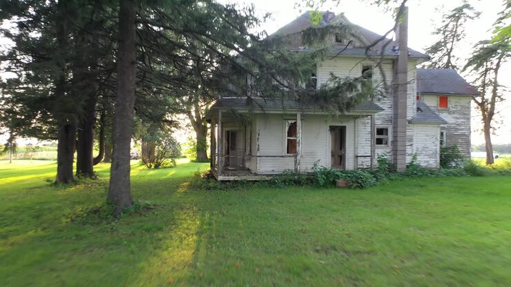 Abandoned Farmhouse in Rural Setting