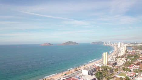 Beautiful-aerial-overview-of-city-near-ocean-in-summer